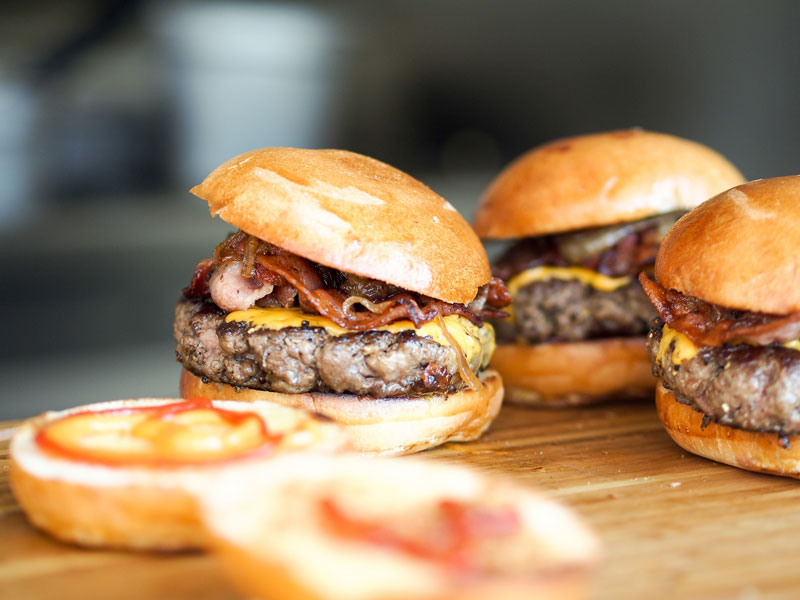 close up of group of burgers